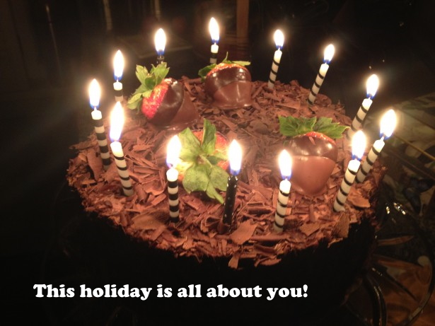 birthday cake with candles and strawberries. label reads "This holiday is all about you!"